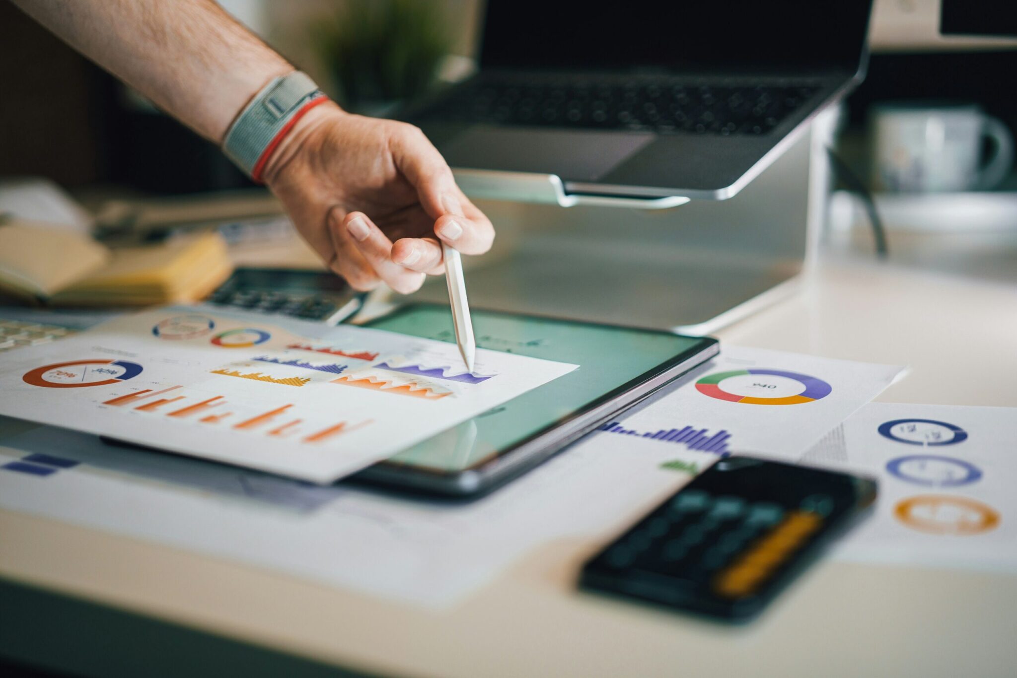 jakub-zerdzicki-ykgLX_CwtDw-unsplash-scaledjpg | ALCON DTS: Austin Best Managed IT Support Services a person is writing on a piece of paper