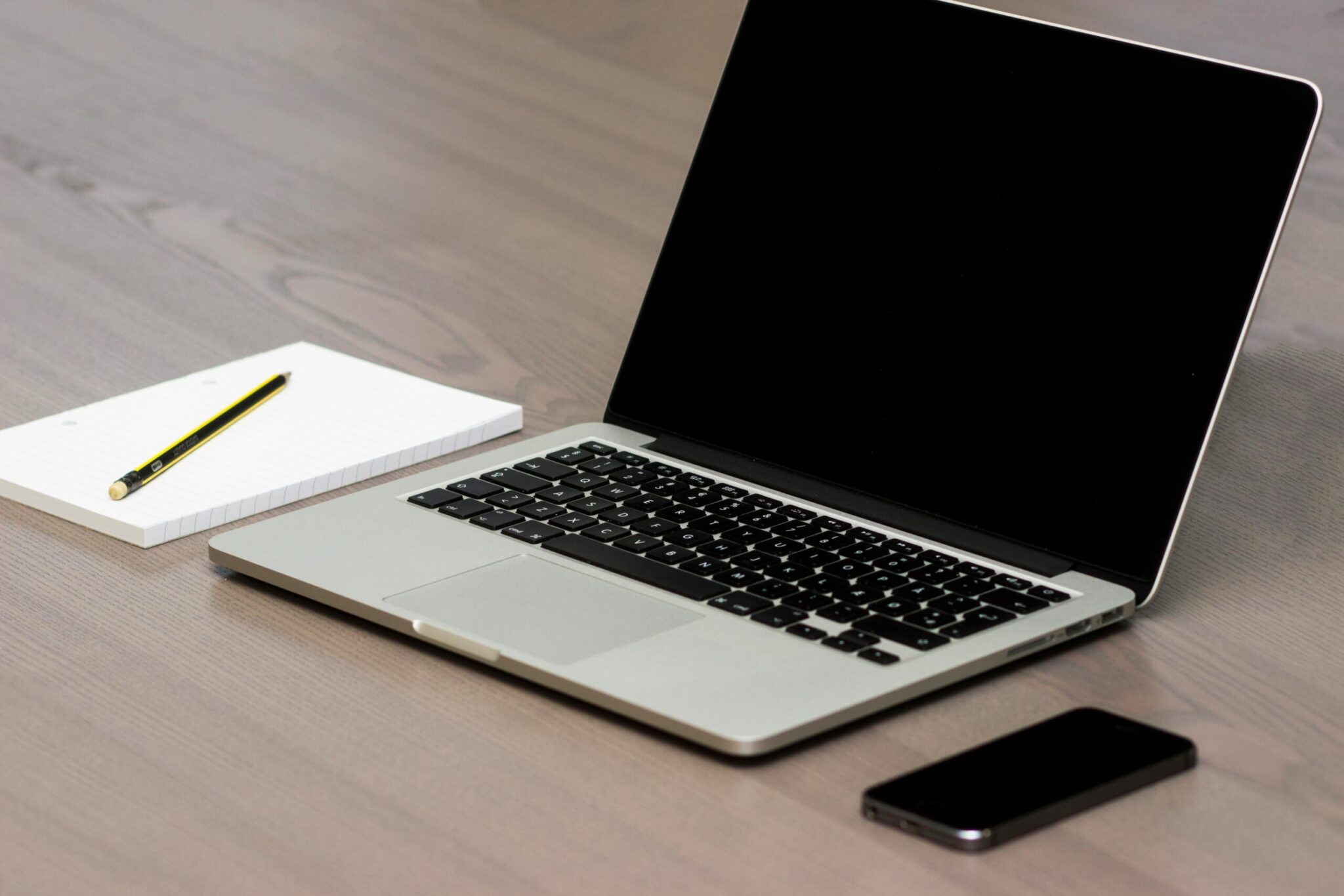 pexels-morningtrain-18104-scaledjpg | ALCON DTS: Austin Best Managed IT Support Services Free Silver Macbook Beside Iphone Stock Photo