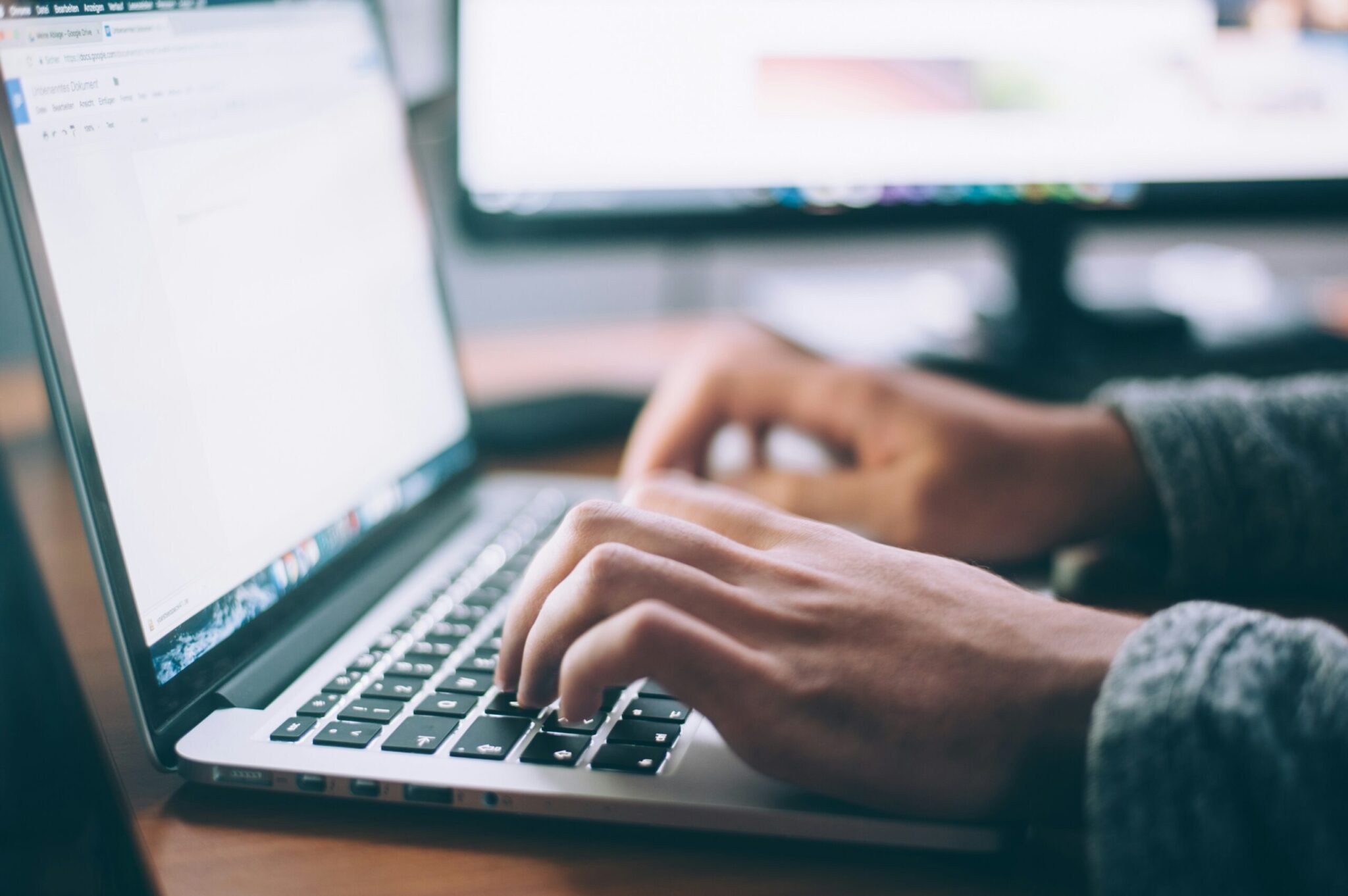 Essential-Settings-to-Maximize-Your-Microsoft-365-Experience-scaledjpg | ALCON DTS: Austin Best Managed IT Support Services Person using Macbook Pro
